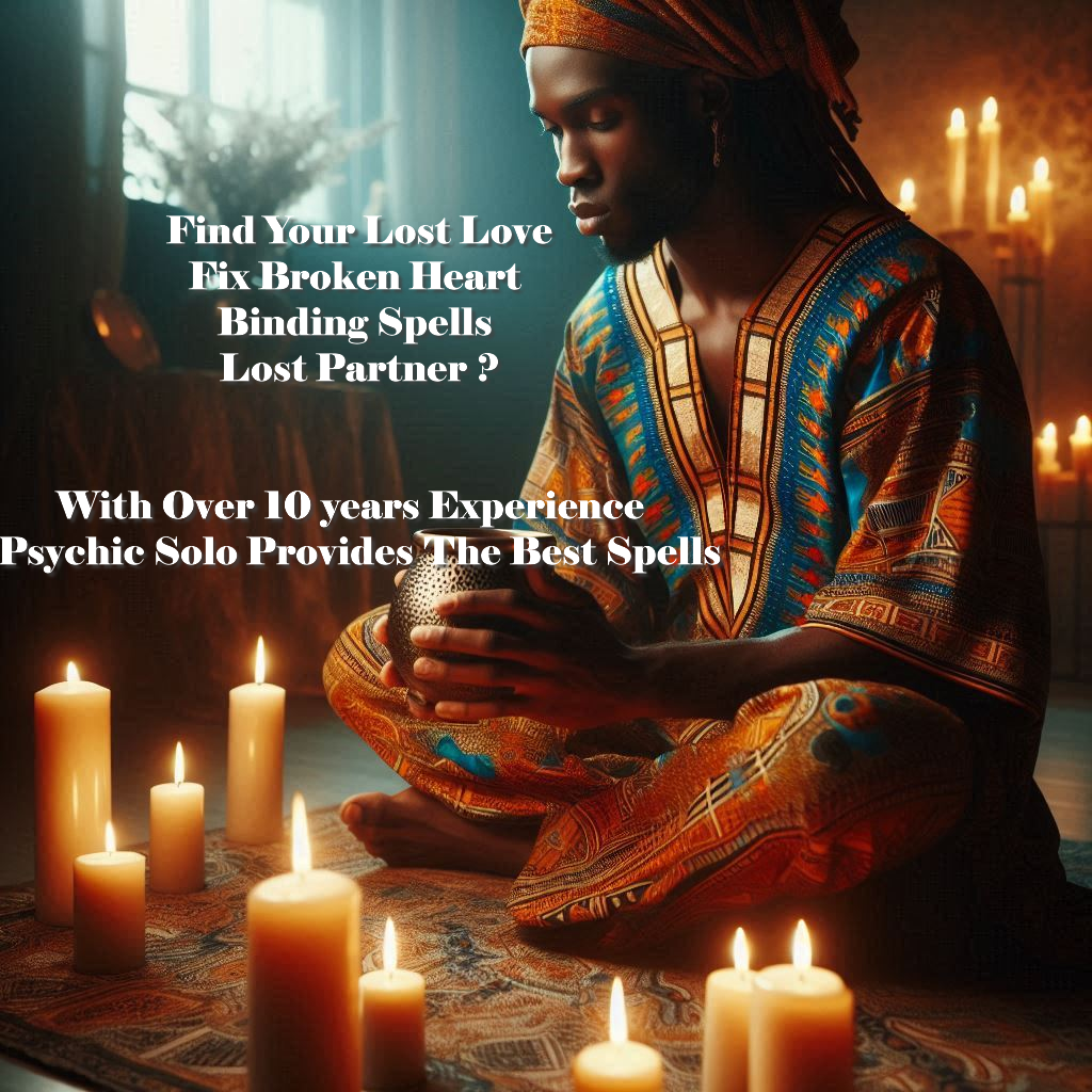 Psychic Solo sitting at a professional desk with a laptop and traditional African spiritual tools, ready to provide marriage spell consultations for US clients