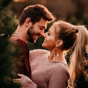 Psychic Solo providing love and relationship spells guidance in Sydney, featuring traditional African shells, pink candles, and a map of Australia.