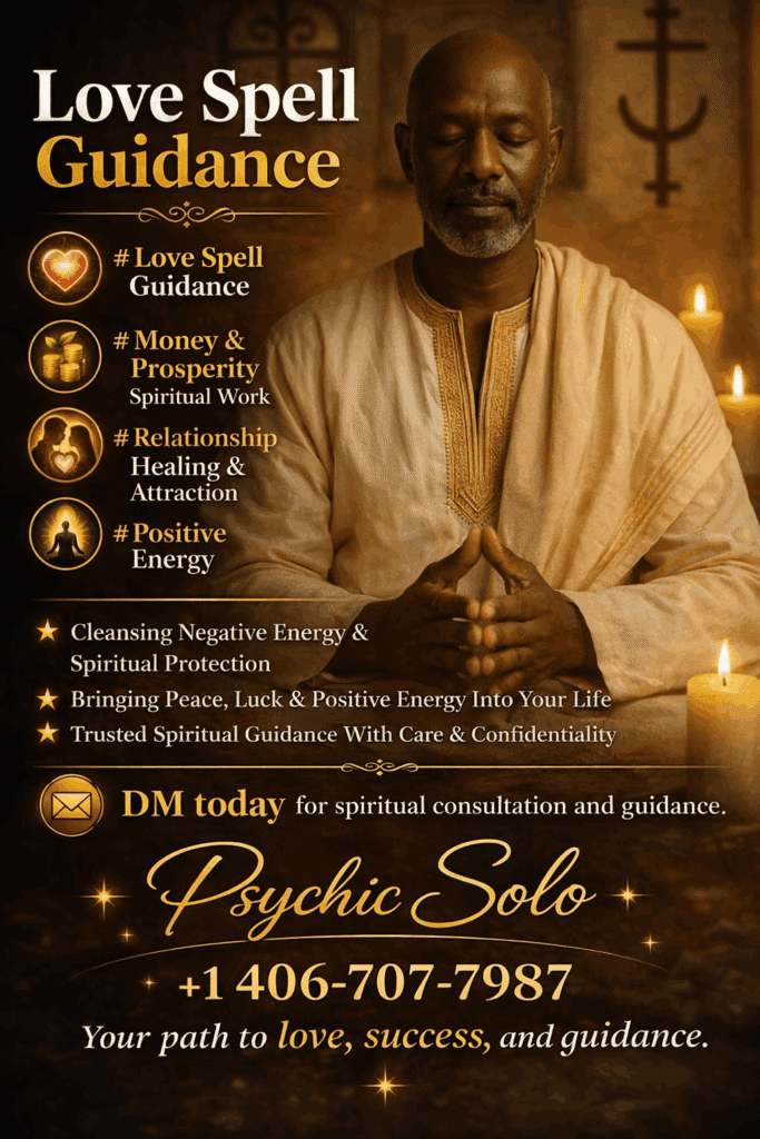 Professional headshot of spiritual consultant Psychic Solo in a welcoming workspace, offering relationship guidance and wellness consultations.